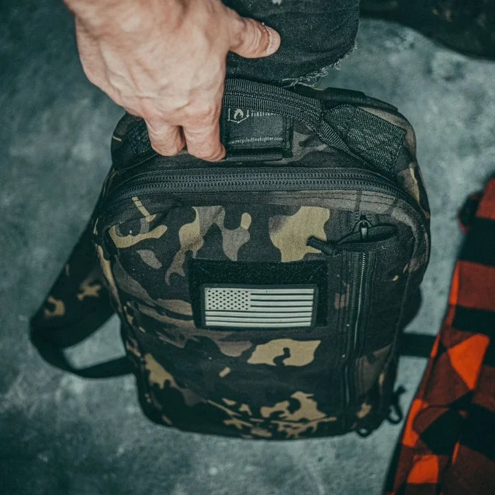 Recycled Firefighter 12 Hour pack in 12 hr mcamblk. Streamlined design handles half-day missions without bulk.