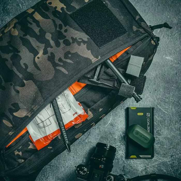 12 Hour Plus Backpack 500D blaze orange interior lining. 24L EDC pack by Recycled Firefighter.