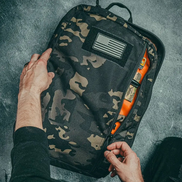 The 24 Hour Backpack 500D in MCAMBLK from Recycled Firefighter. Professional-grade quality for everyday tactical use and operations.