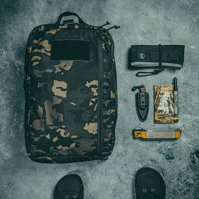 The 24 Hour Backpack 500D in MCAMBLK from Recycled Firefighter. Professional-grade quality for everyday tactical use and operations.