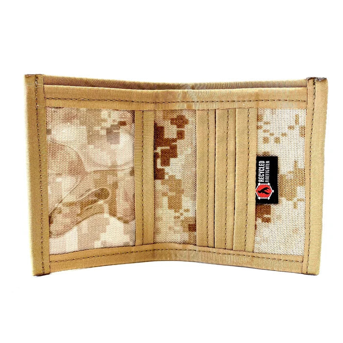 "The Captain" by Recycled Firefighter is a rugged bifold wallet handcrafted from decommissioned fire hose for maximum durability. Its slim, wide-profile design features a clear ID window and is built to lay flat in your pocket.