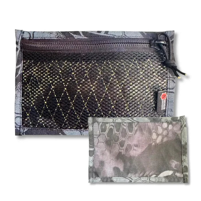 The Flat EDC Pouch X-Pac RAID in Xpac raid & Typhon by Recycled Firefighter. Tactical design meets professional durability standards.