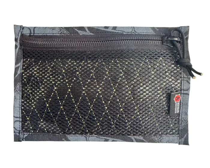 The Flat EDC Pouch X-Pac RAID in Xpac raid & Typhon by Recycled Firefighter. Tactical design meets professional durability standards.